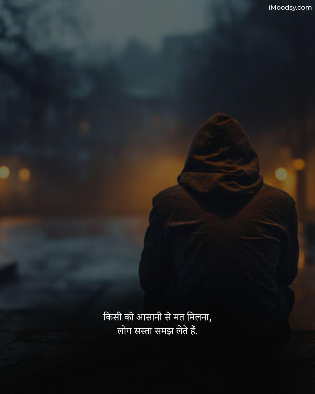 Sad Status in Hindi For Boys featuring a person in a hoodie sitting alone at night, reflecting on the value of people.